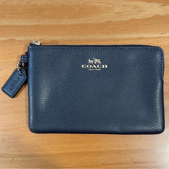 Coach Handbags - COACH CORNER ZIP LEATHER WRISTLET